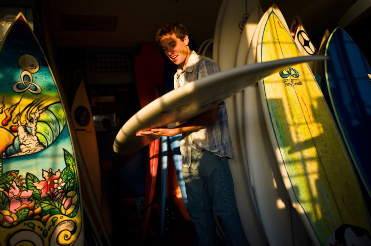 Tommy Witt, of San Clemente, Calif., picks up his new board at Terry Senate's surf shop, May 2, 2011.